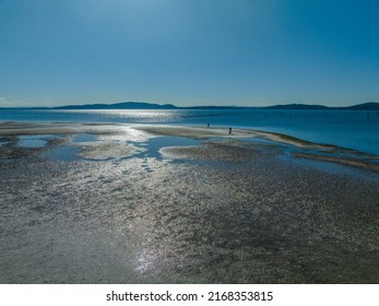 Sunlit sea water at Tilligerry Creek with boats and birds at Lemon Tree Passage, Port Stephens, NSW, Australia. - Shutterstock ID 2168353815