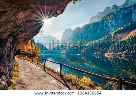 Sunny autumn scene of Vorderer ( Gosausee ) lake. Colorful morning view of Austrian Alps, Upper Austria, Europe. Beauty of nature concept background.