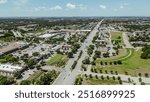 Sunny blue sky over intersection of Keller Parkway, Farm to Market Road 1709, Rufe Snow Drive, Keller, Texas, fast-growing mixed-use development area suburbs Dallas Forth Worth Metroplex, aerial. USA