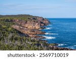 A sunny day, Brook Point. The spectacular multi-coloured rock layers exposed here at Brook Point are from the Crown Hill Formation. -King