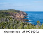 A sunny day, Brook Point. The spectacular multi-coloured rock layers exposed here at Brook Point are from the Crown Hill Formation. -King