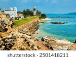 Sunny day, harbour and lighthouse in Galle, Sri Lanka . January 29 2021. This was during the Covid 19 pandemic. Such rich beautiful colours on a hot day.