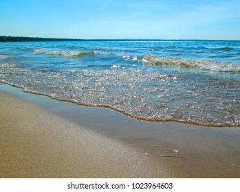 Sunny day on beach at Lake Michigan, USA. Beautiful scenery from the Great Lakes region.