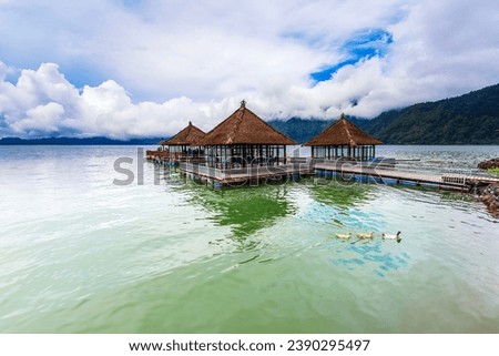 Sunny day over Floating Restaurant at Lake Batur Kintamani, Bali, Indonesia
