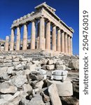 Sunny day at the Parthenon, located in the Acropolis (Athens, Greece)