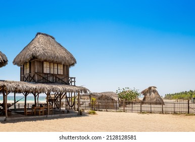 The sunny day in tropical paradise, beach cabin, Caribbean Playa La Ventanilla - Powered by Shutterstock