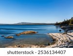 Sunny day, West Thumb Geyser Basin, on the shore of Yellowstone Lake.  -Yellowstone National Park, Wyoming, ⁩⁨‎⁨United States.⁩⁨ 
