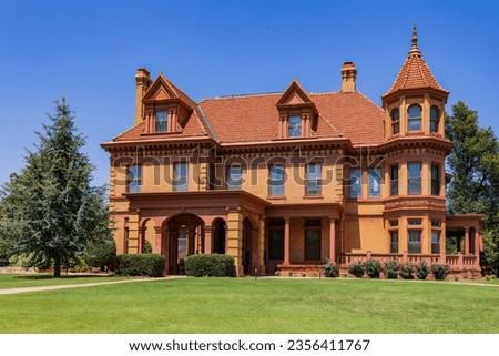 Sunny exterior view of the Henry Overholser Mansion at Oklahoma
