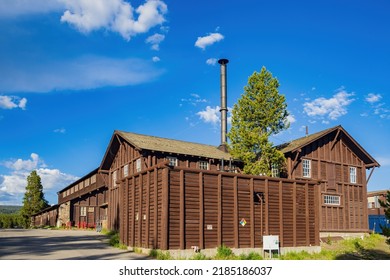 Sunny Exterior View Of The Old Faithful Lodge At Wyoming