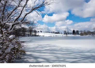 Sunny Frozen Pond In The Hudson Valley Of New York 