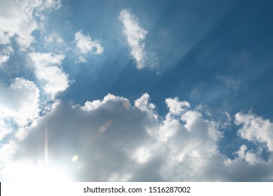 sunny light beam with flare and bokeh , beautiful heaven sky bright scenic .