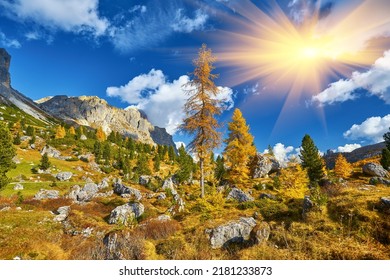 Sunny picturesque autumn alpine Dolomites rocky mountain view from hiking path from Giau Pass to Cinque Torri Five pillars or towers rock famous formation, Sudtirol, Italy.