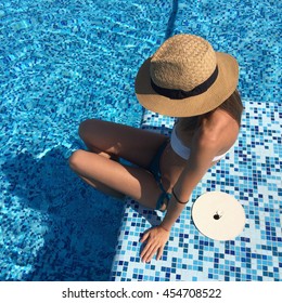 Sunny Portrait Beautiful Girl On The Top Of Rooftop In A Pool.sexy Girl In A Hat,swimsuit,swimwear, Skinny Body,athletic Figure,sunshine,relax Time,beautiful Tan