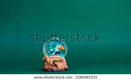 Sunny Relaxation: A Snow Globe with Beach Chair and Umbrella