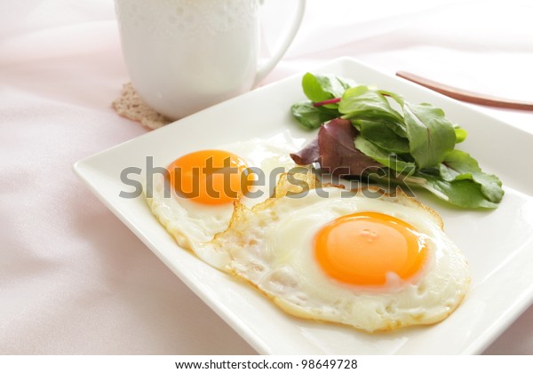 Sunny side up and\
baby leaves for breakfast