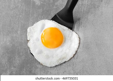 Sunny Side Up Egg On A Spatula