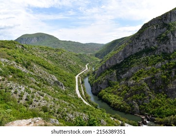 Sunny spring day and view from above of the mountain on Nisava River and Sicevo Gorge Nature Park near City of Nis. - Shutterstock ID 2156389351
