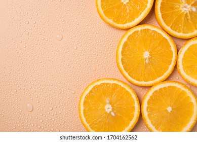 Sunny Summer Concept. Top Above Overhead Close Up View Photo Of Juicy Orange Slices On Table With Water Drops With Place For Text Copy Blank Empty Space