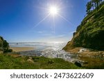 Sunny summer day at Hug Point State Park in Canon Beach, Oregon