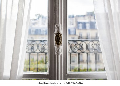 Sunny Summer Day Through a European Balcony Window in Paris France
