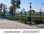 Sunny view of the Church of the Life-Giving Spring, Cathedral Square, and Lenin Garden in Arzamas, showcasing historical architecture and lush greenery