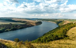 Sunny View On Panorama Of The Dniester River. Landscape With Canyon, Forest And A River In Front. Beautiful Nature Scenery Wth Perfect Blue Sky And Calm Majestic River. Dniester River. Ukraine