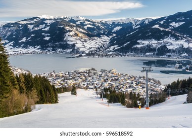 Sunny view of ski slope near Zell am See, Austria. - Shutterstock ID 596518592