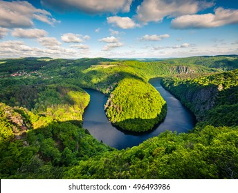 Sunny view of Vltava river horseshoe shape meander from Maj viewpoint. Colorful spring scene in Czech Republic. Artistic style post processed photo.