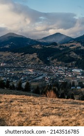 Sunny Weather In The Mountains Landscape With Blue Sky, White Clouds And Top View Of Carpathian Mountains, Vorokhta, Dead Grass Field