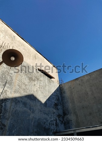 Similar – Weeds Growing in a Blocked Suburban House Rain Gutter