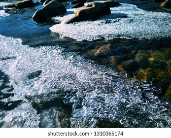 Sunny Winter Day At River, Ice And Snow On The River Bank