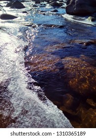 Sunny Winter Day At River, Ice And Snow On The River Bank