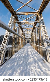 sunny winter landscape with iron construction bridge, Valmiera, Latvia - Shutterstock ID 2235473643