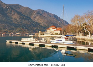 Sunny Winter In Montenegro. View Of Bay Of Kotor And Building Of The Institute Of Marine Biology In Dobrota Town