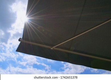 Sunprotecting Awning From Fabric Material, Sky And Sunlight