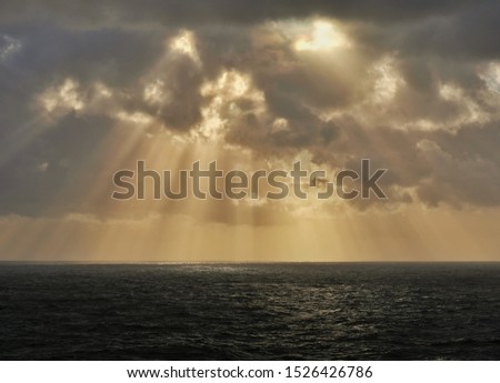 Sunrays on the sea, somewhere off Norway