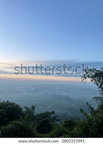 Sunrice view with clouds on the mountain