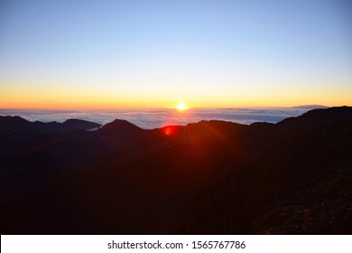 Sunrise Above Clouds From Haleakala Volcano Mountain, Maui, Hawaii