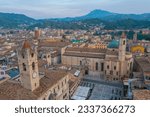 Sunrise aerial view of Palazzo dei Capitani del Popolo and church of saint francis in Italian town Ascoli Piceno.