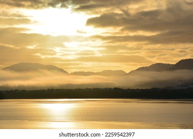 Sunrise in Alaska coastal rainforest. Every morning provides a different kind of beauty and colors - Shutterstock ID 2259542397