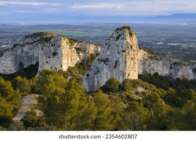 Sunrise in the Alpilles (Provence, France) on a partly cloudy day in springtime