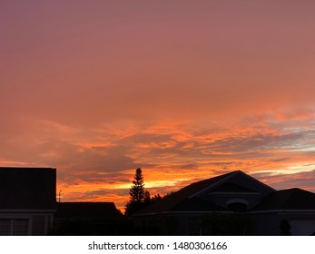 Sunrise In Apollo Beach Florida Between Rain Clouds