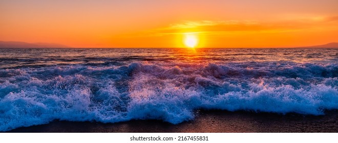 A Sunrise Back Lit Ocean Wave Is Breaking On The Beach Shore In High Resolution Banner Image Format - Shutterstock ID 2167455831
