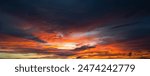 Sunrise background. Dramatic majestic scenery sunset. Sky with clouds in Sunrise sky light background. Sunrise with clouds in various shapes. Calm Sunrise sky and sun through clouds over.