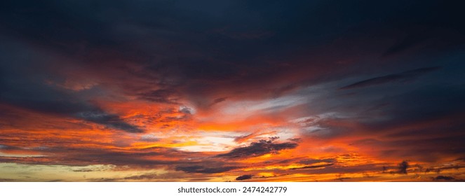 Sunrise background. Dramatic majestic scenery sunset. Sky with clouds in Sunrise sky light background. Sunrise with clouds in various shapes. Calm Sunrise sky and sun through clouds over. - Powered by Shutterstock