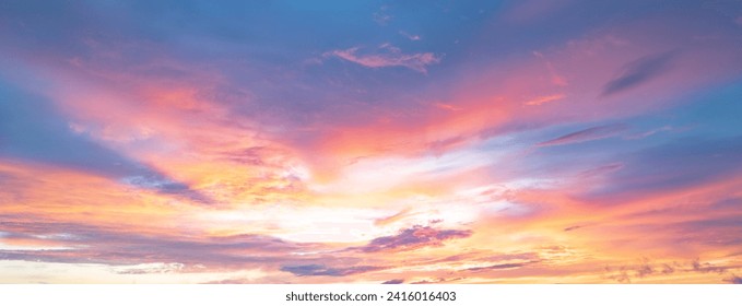 Sunrise background. Dramatic sunset background. Sky with clouds in Sunrise sky light background. Sunrise with clouds in various shapes background. Calm Sunrise.