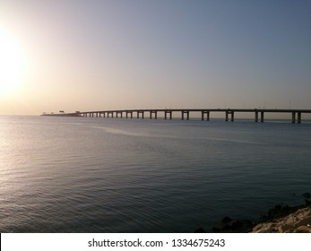 Sunrise At The Bahrain Causeway Bridge