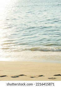 Sunrise Beach Flares With Footprints