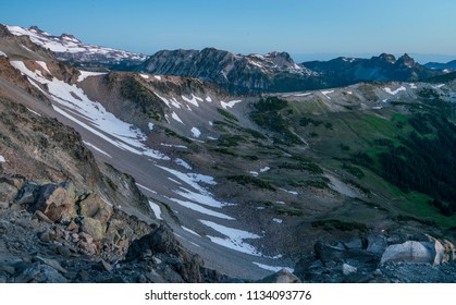 Sunrise from Burroughs Mountain over Mt Rainier - Shutterstock ID 1134093776