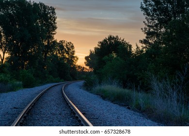 Sunrise in central Iowa over traintracks.